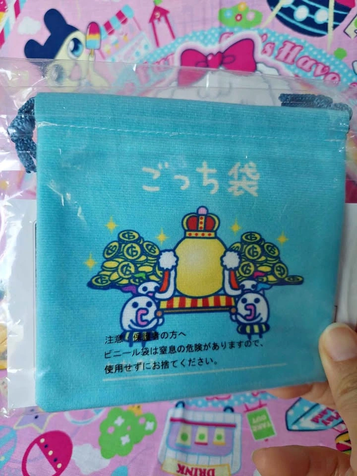 🏈 Tamagotchi Raffle Prize E - King Gotchi and Treasury Bag