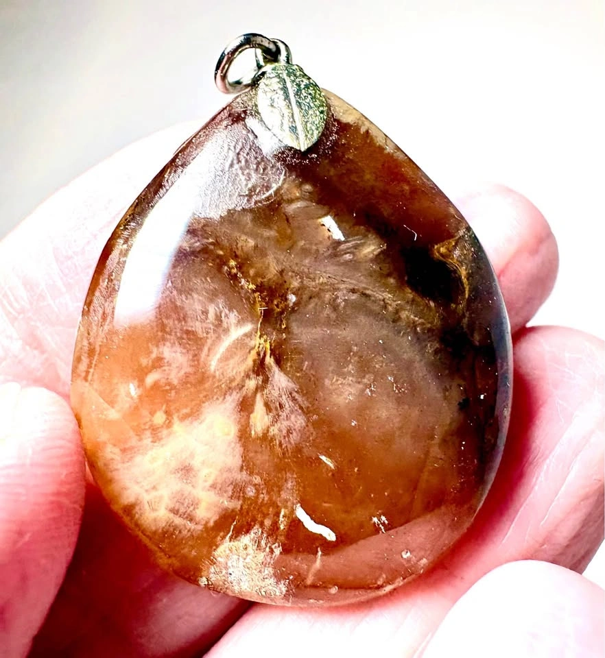 Polished Brown Stone Teardrop Pendant with Silver Leaf Bail