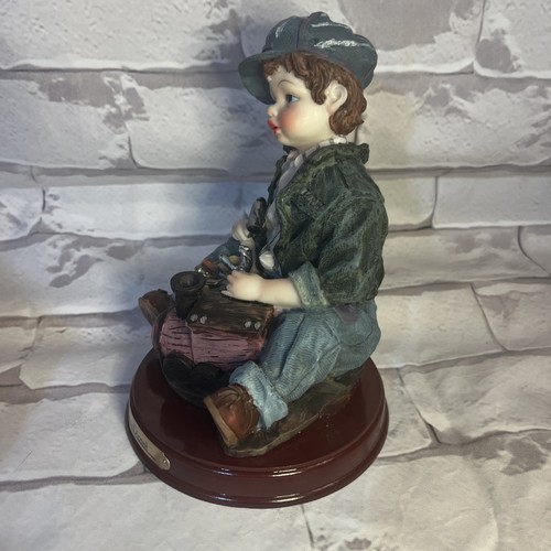 Louis Dionne Vintage Collectible Resin Figurine with Toy Train - photo 2