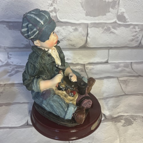 Louis Dionne Vintage Collectible Resin Figurine with Toy Train - photo 3