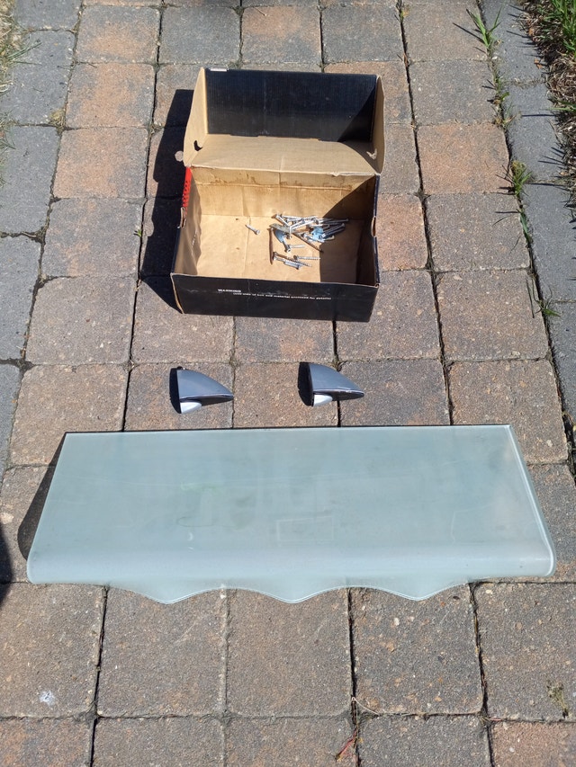 Floating glass oblong shelf (one available)