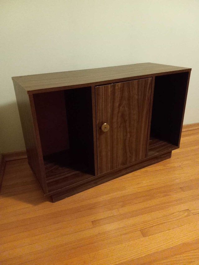Wooden cabinet with centre door