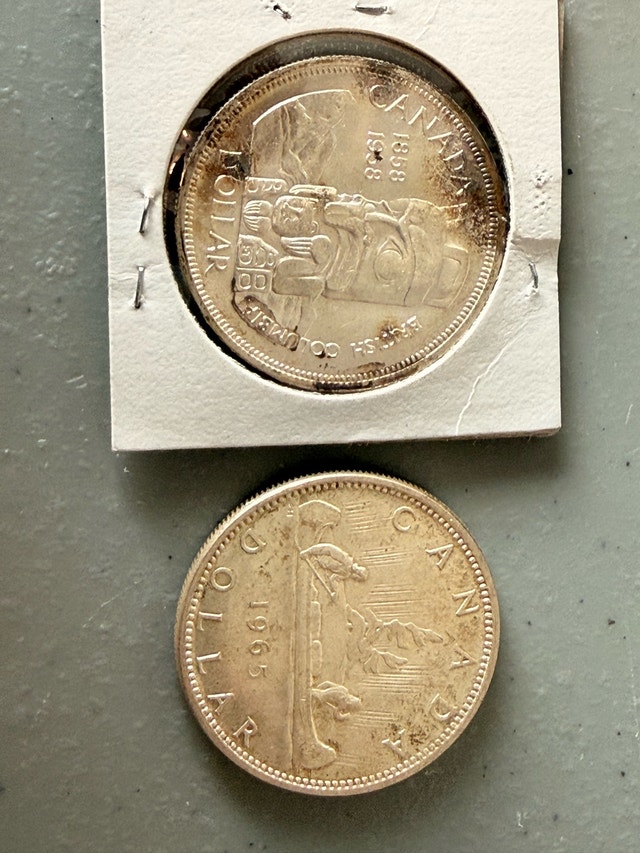 Pair of Vintage Canadian 80% Silver Dollars