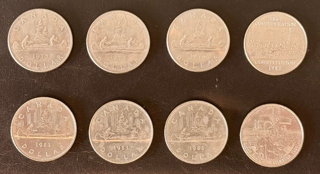 Canadian dollar coins and half dollar coins