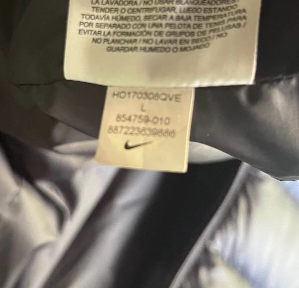 Nike Down Hooded Asymmetrical Zip Puffer Jacket in Black Size Lg - photo 4