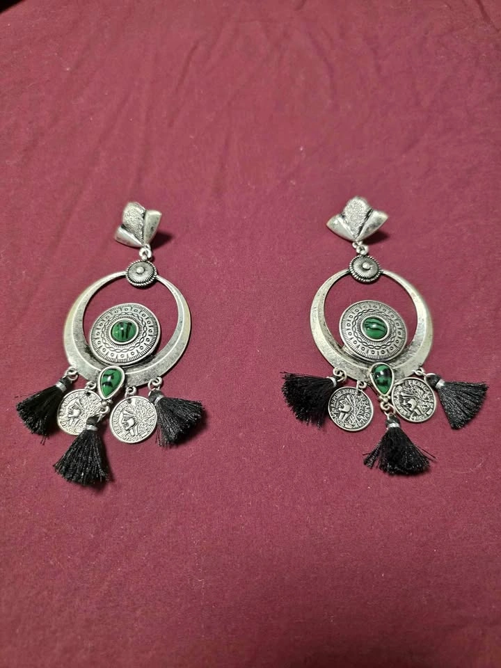 Vintage-style statement earrings with green stone