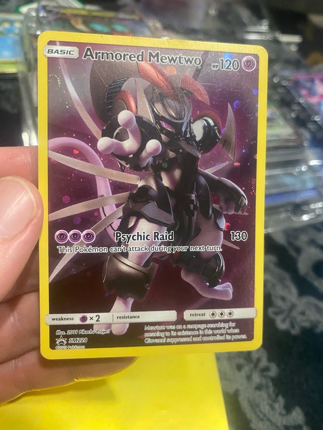 Armored Mewtwo SM228 Black Star Promo Pokémon Card