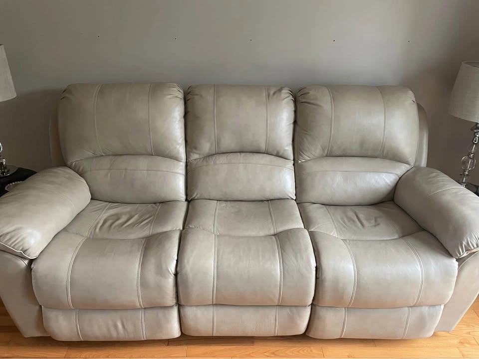 Comfortable power reclining leather sofa