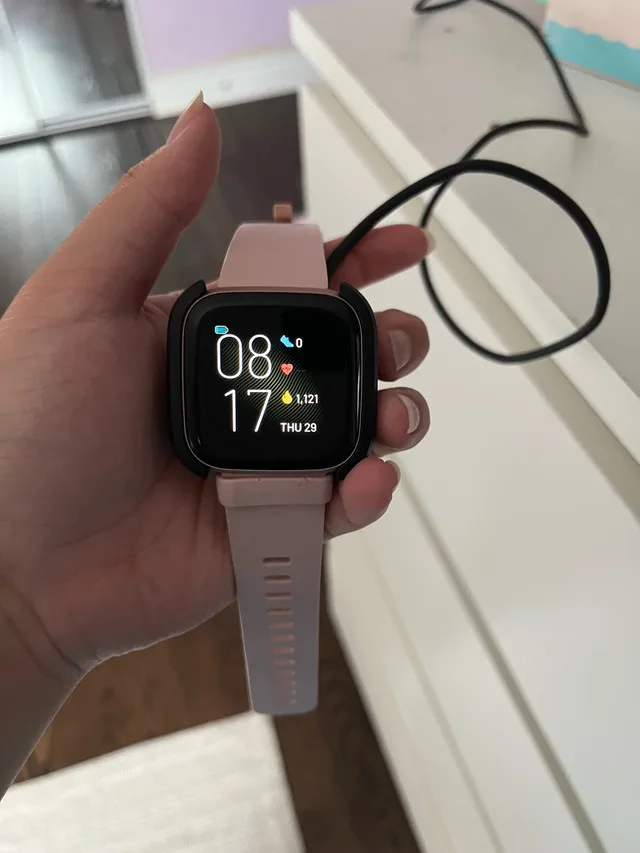 Fitbit versa 2 comes with a charger thumbnail