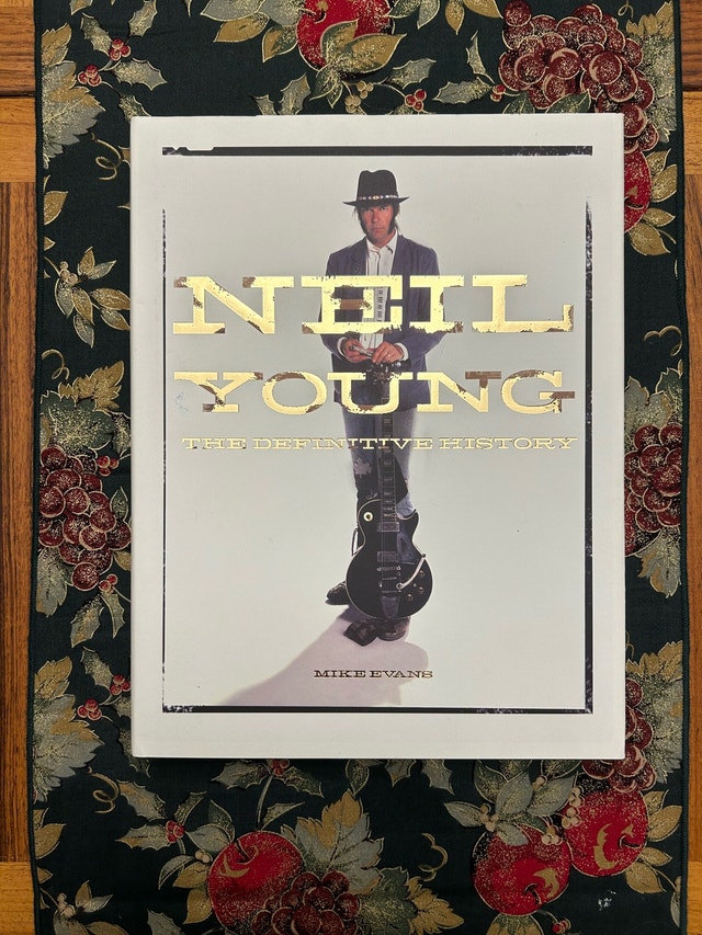 Neil Young by Mike Evans Hardcover 🏈