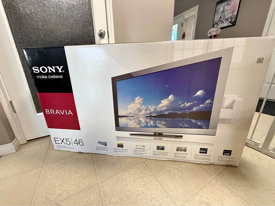 Sony Bravia 46" LCD TV and Glass Corner Stand