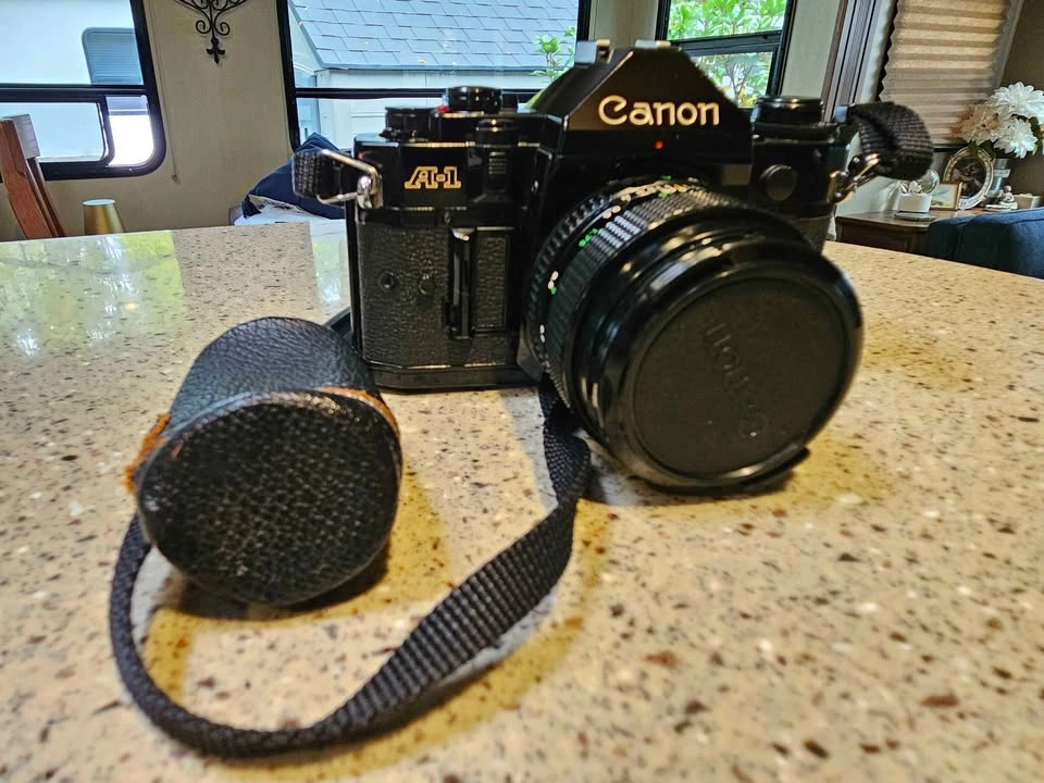 CANON A-1 35mm SLR Film Camera with 50mm F/1.4 Lens Bundle - photo 4