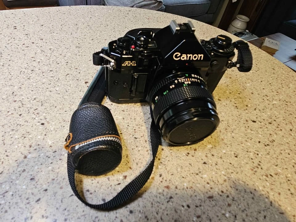 CANON A-1 35mm SLR Film Camera with 50mm F/1.4 Lens Bundle - photo 5