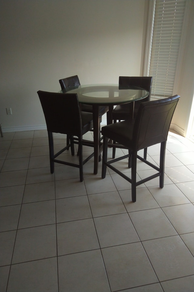 Crate and Barrel 42" Round Glass Table Beveled edge
