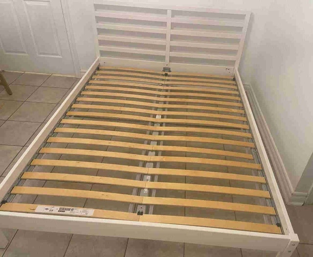 Ikea queen bed frame + Luroy base