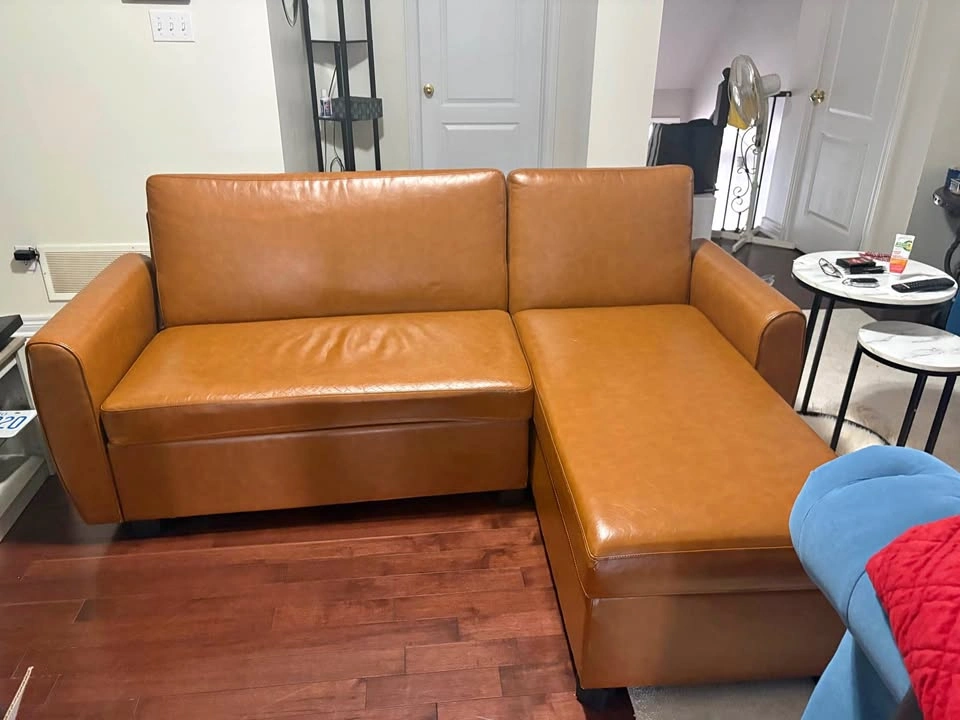 L Shaped Leather Couch (with Pull-out bed & storage!)