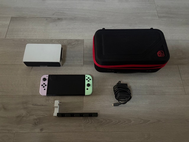 Nintendo Switch OLED + Joycon Charging Stand and Case