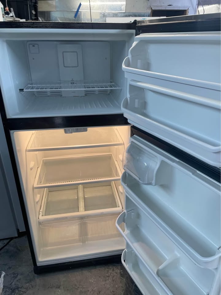30 inch black and silver fridge and stove - photo 4