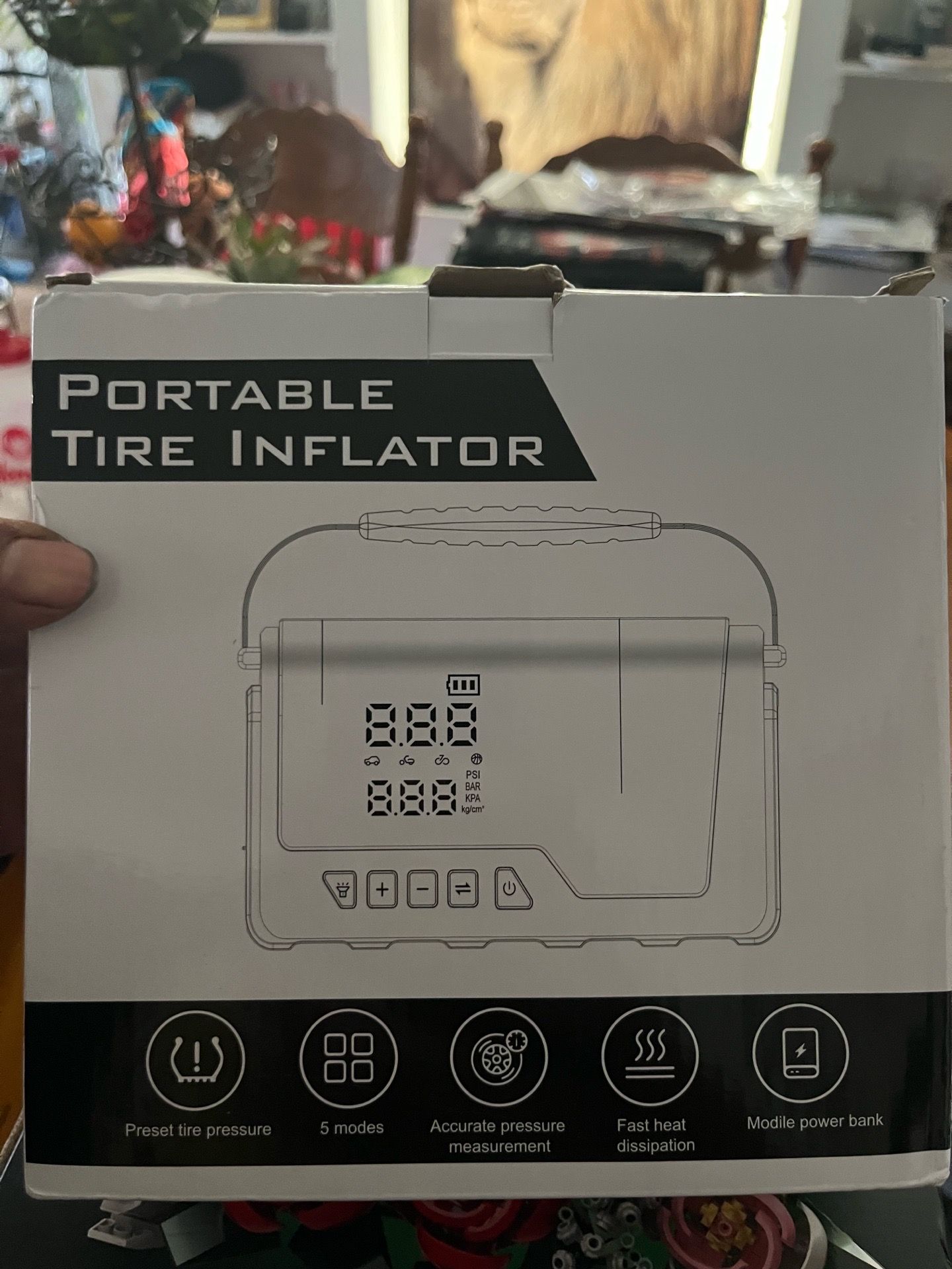 Tire inflator and battery pack