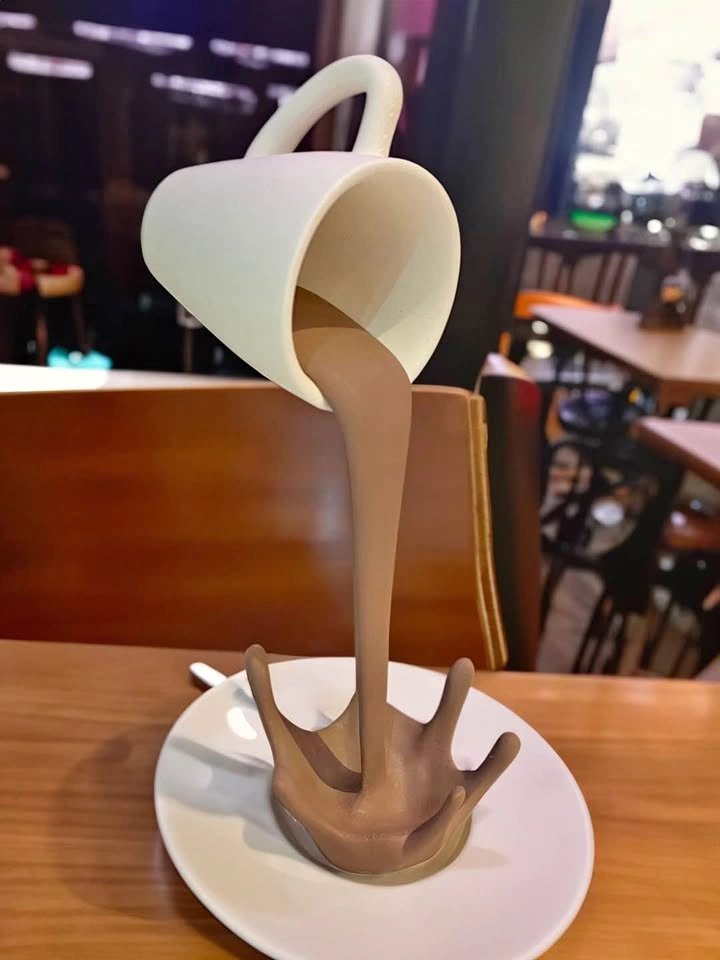 Floating Coffee Cup Sculpture – Gravity-Defying Desk Decor