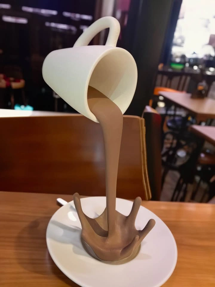 Floating Coffee Cup Sculpture – Gravity-Defying Desk Decor - photo 2