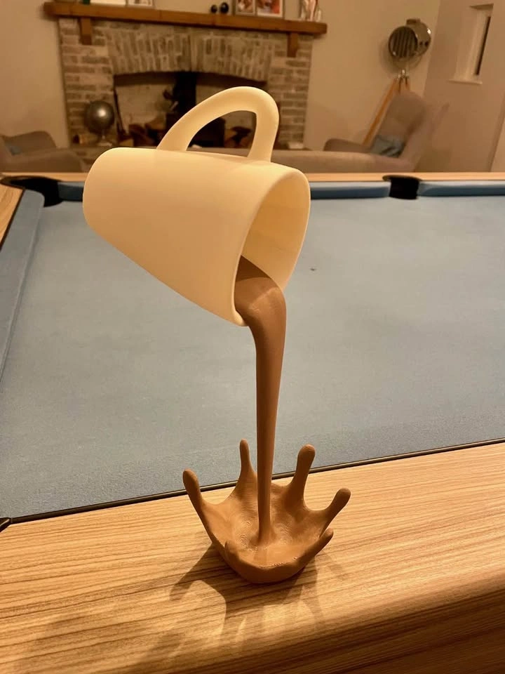 Floating Coffee Cup Sculpture – Gravity-Defying Desk Decor - photo 4