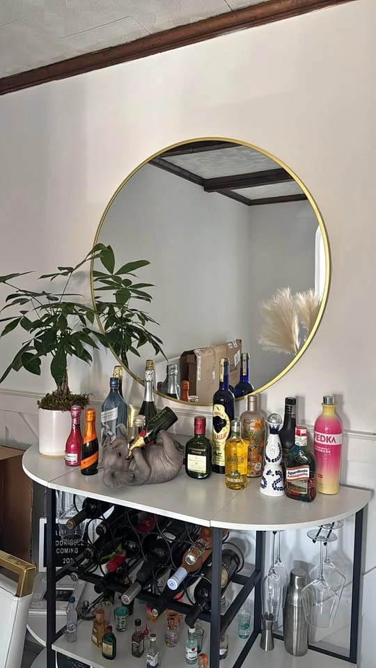 Gold round mirror