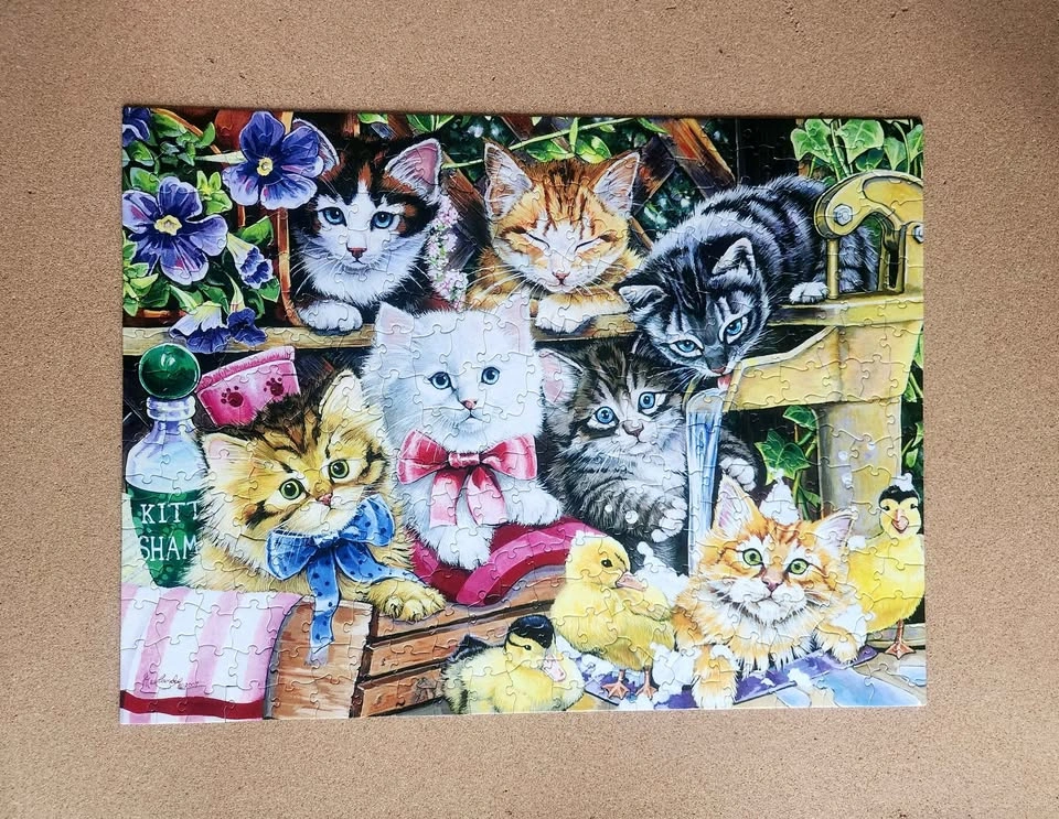 Four 300-piece Puzzles Bundle - photo 5