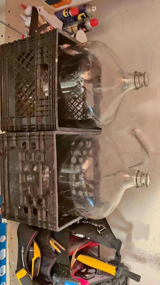 Home Brewing supplies with 2 Carboys and Bottles
