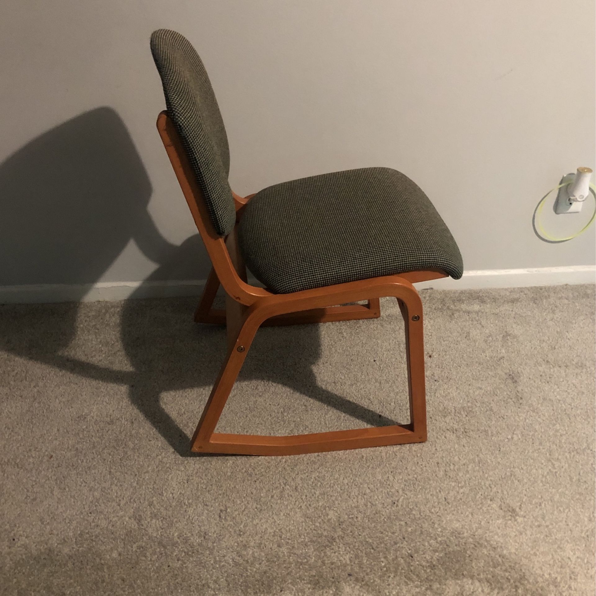 Green Rocker Chair With Neat Brown Wooden Finish