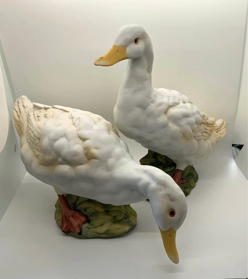 Duck figurines, pair of white bisque porcelain