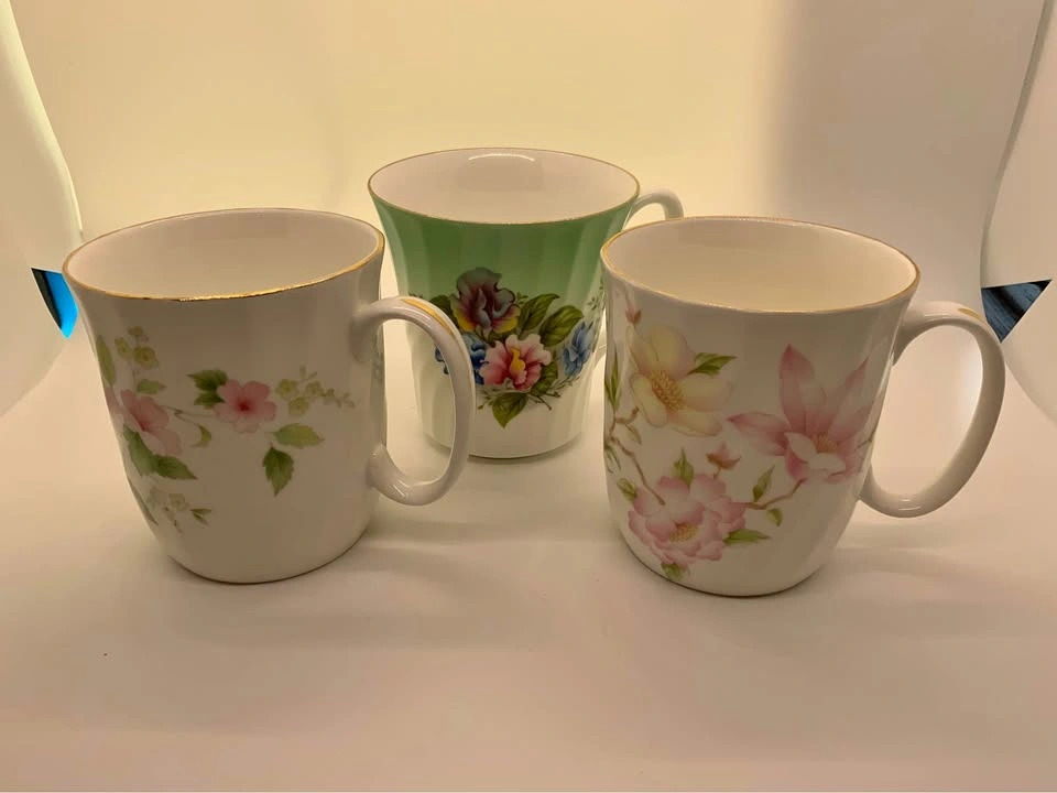 Collection of 3 china mugs with floral pattern