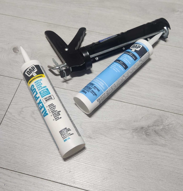 Caulk Gun & 2 Unopened Tubes of Dap Caulk