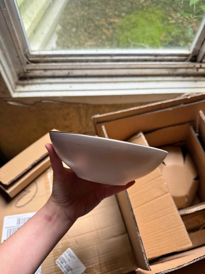 Bowls, small and large plates and mugs - place setting