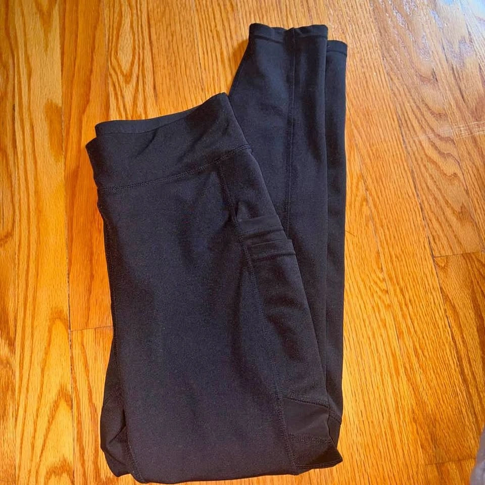 Black POPFIT leggings with cute leg design and pockets size medi