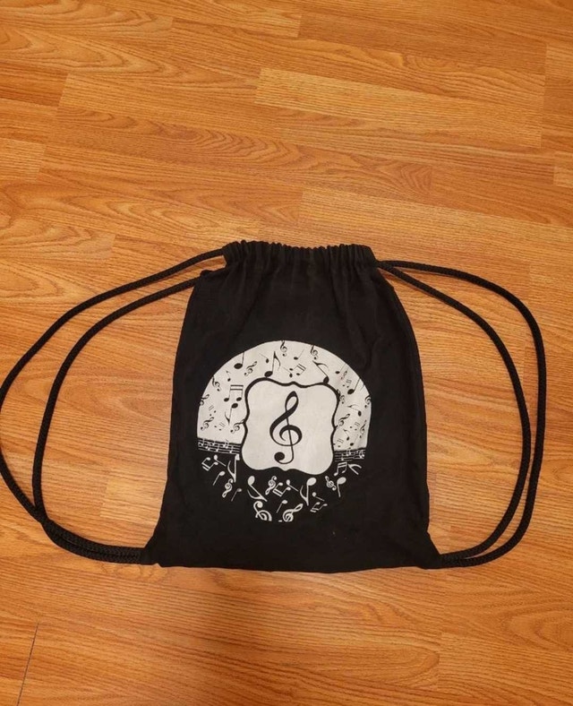 Black Music Note Drawstring Backpack