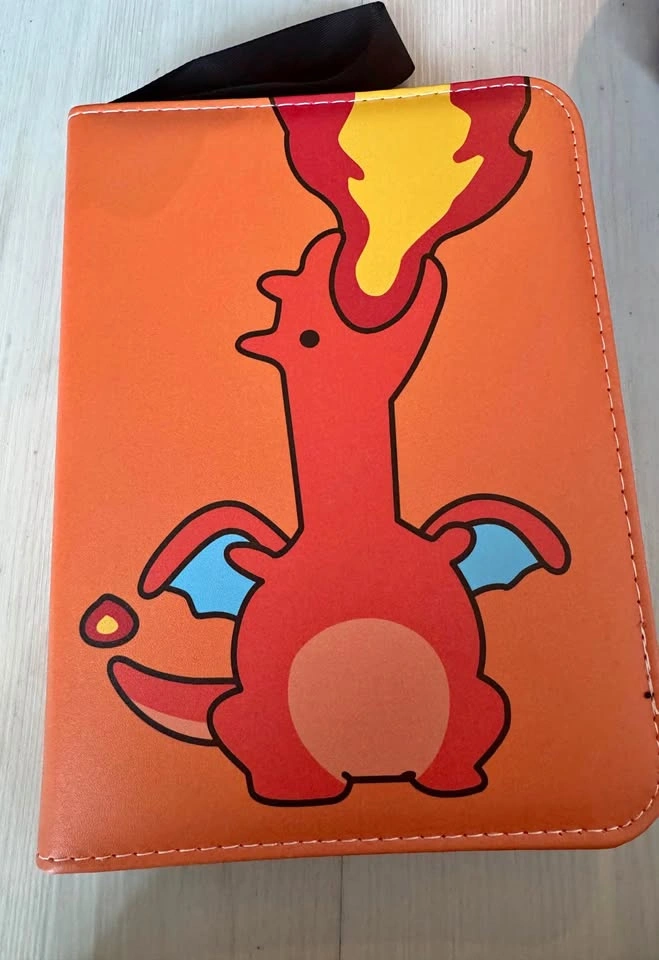 Filled Pokémon Charizard card binder