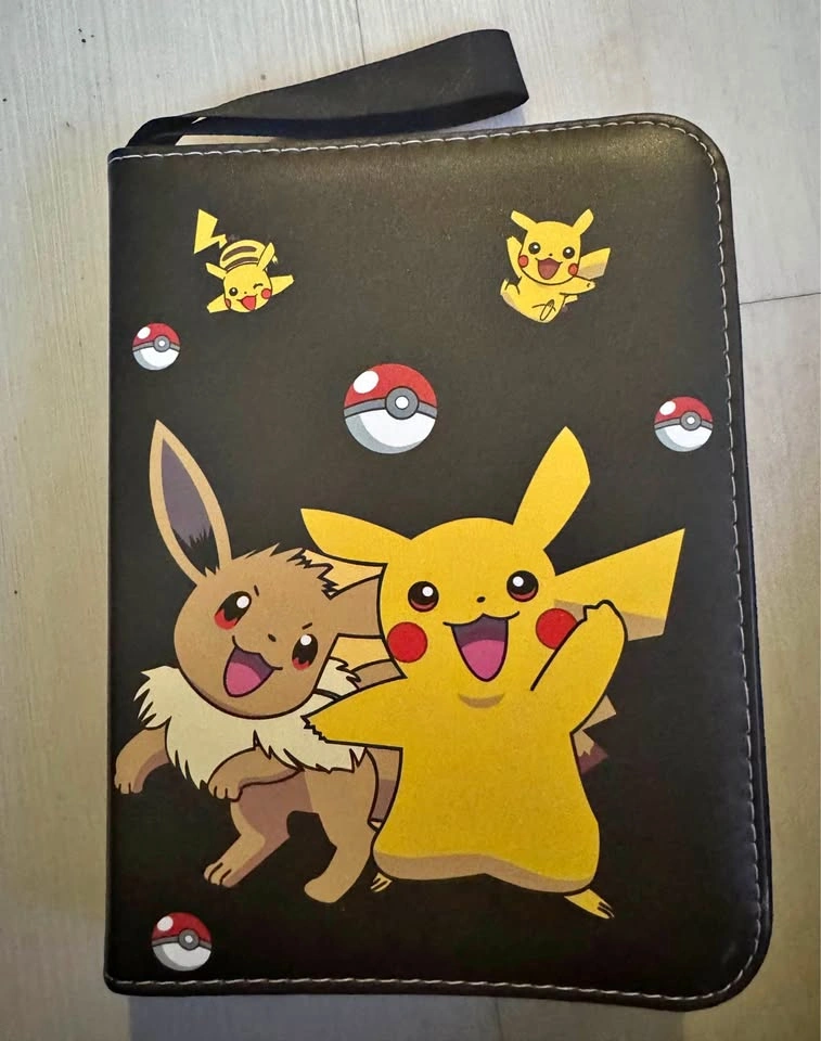Filled Pokémon card binder