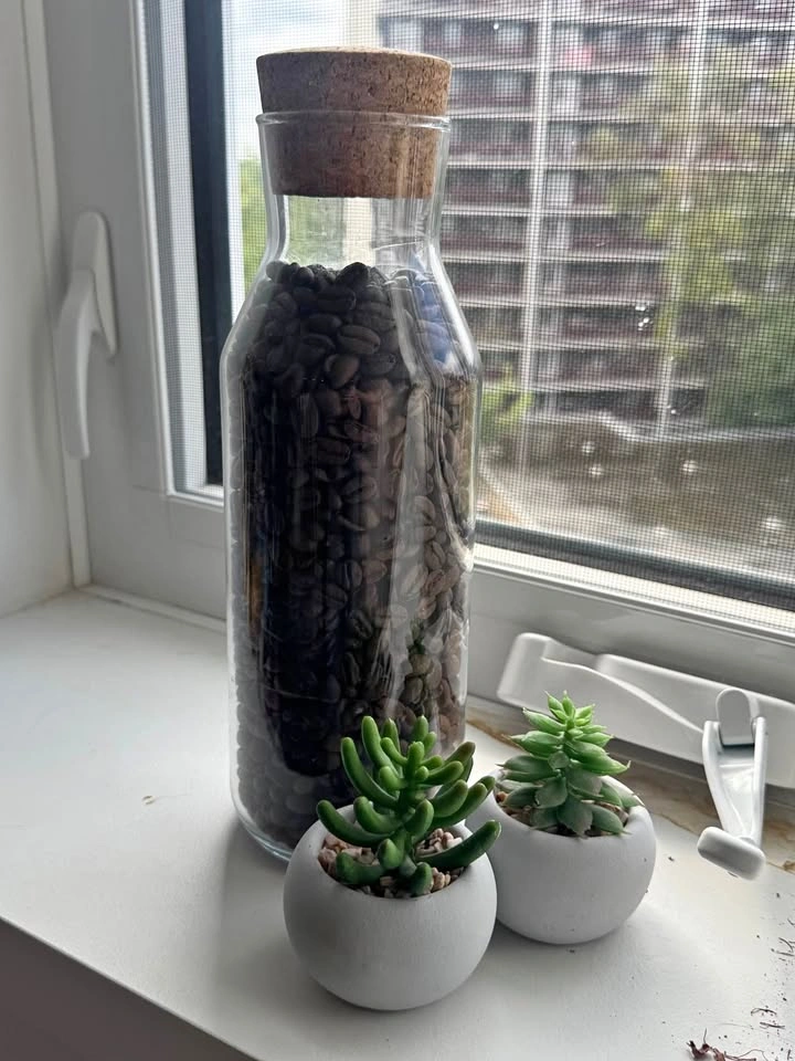 Glass jug with coffee beans - purely decorative