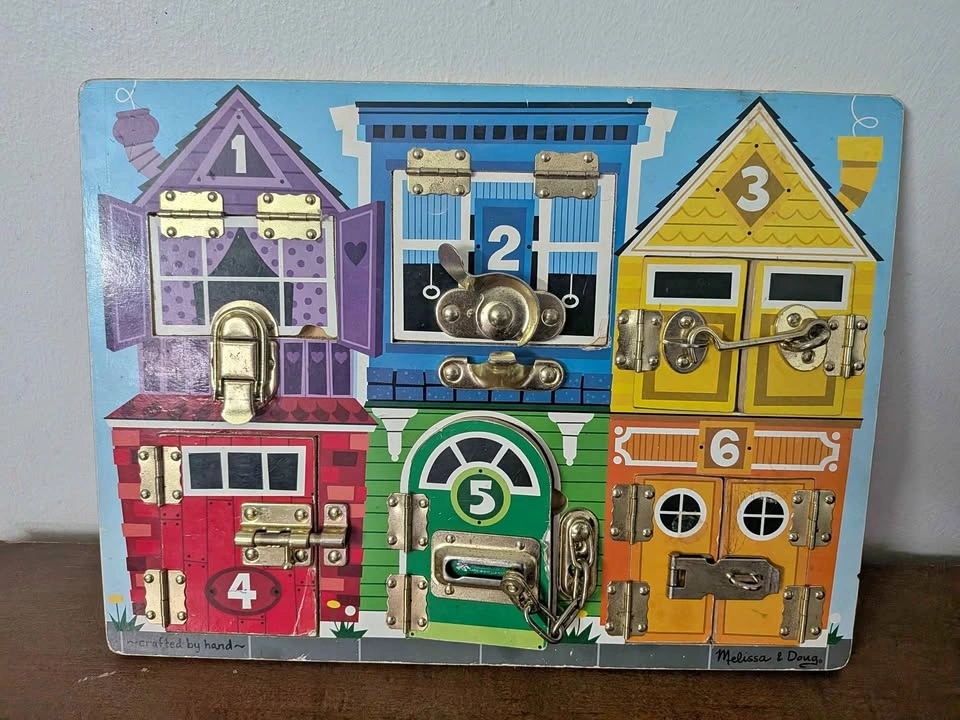 Melissa & Doug Wooden Latches Board – Toddler Activity Board