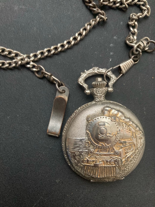 train embossed pocket watch