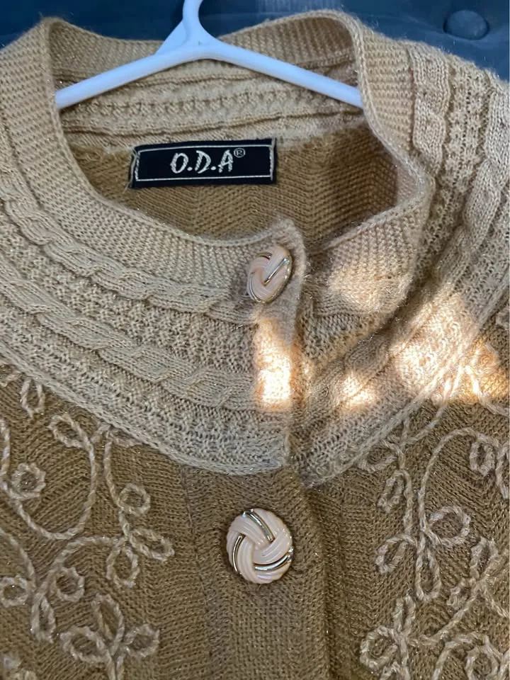Women warm sweater with golden button details image indicator(4)