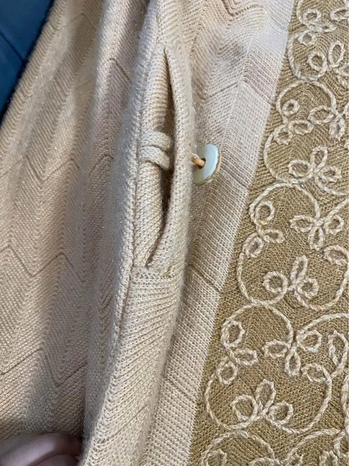 Women warm sweater with golden button details image indicator(5)