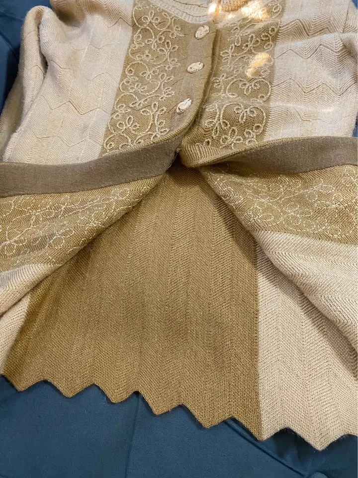 Women warm sweater with golden button details image indicator(6)