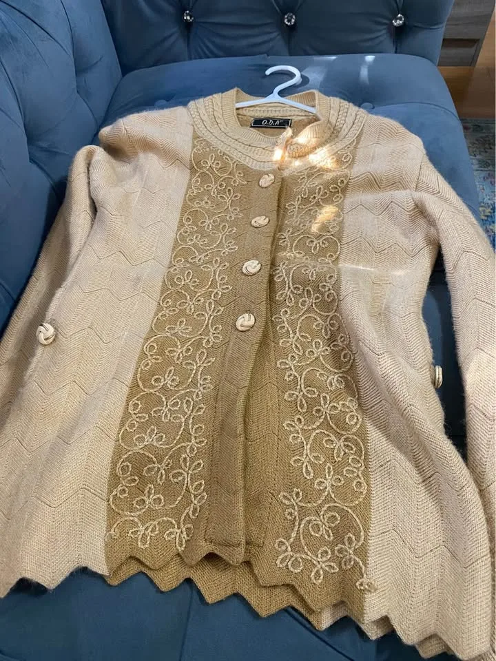 Women warm sweater with golden button details image indicator(9)