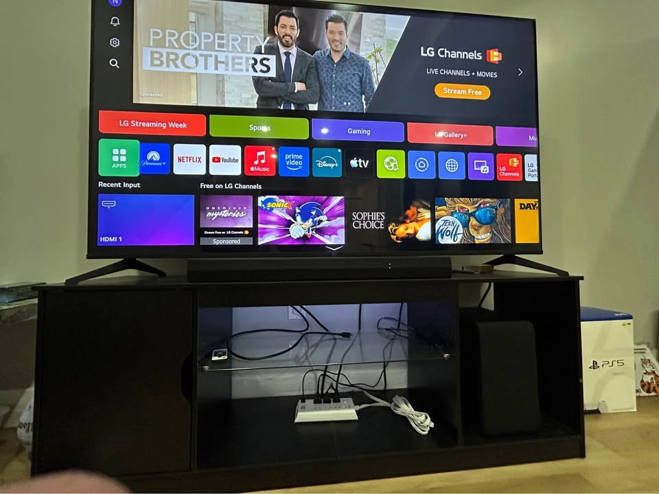 65” LG 4K Smart TV, LG Soundbar, and TV Stand - photo 2