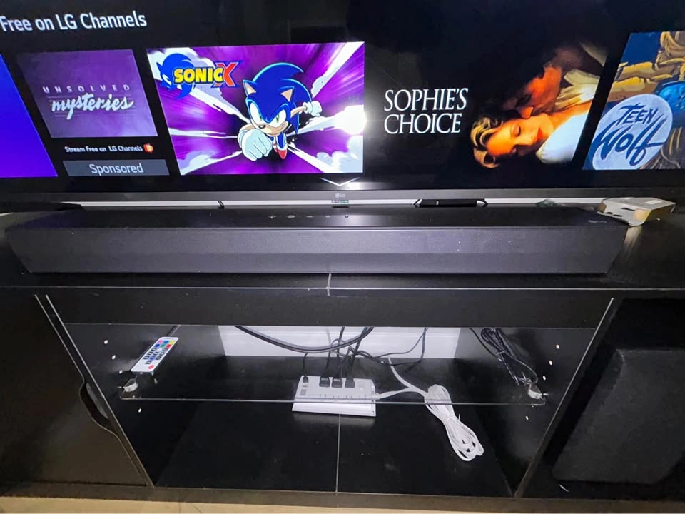 65” LG 4K Smart TV, LG Soundbar, and TV Stand - photo 4