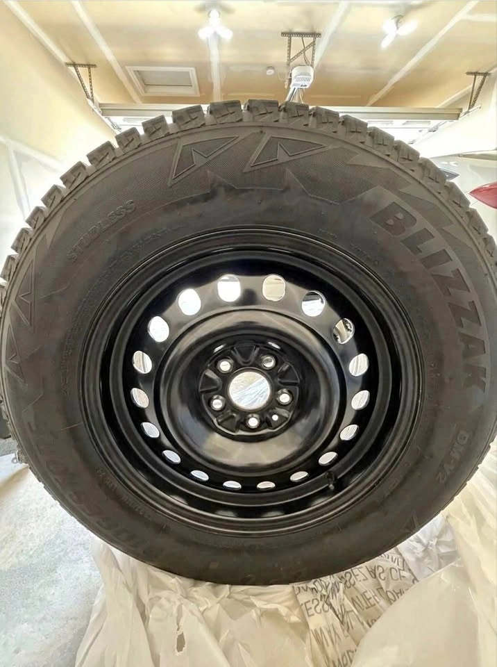 Bridgestone Blizzak DM-V2 235/65R17 Winter Tires + Steel Rims