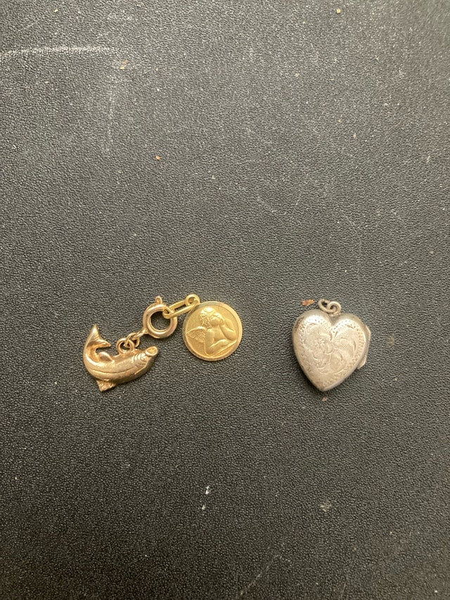 silver and gold pendants