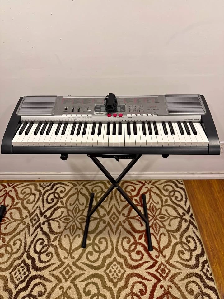 Casio LK-230 61-Key Light-Up Keyboard + Stand
